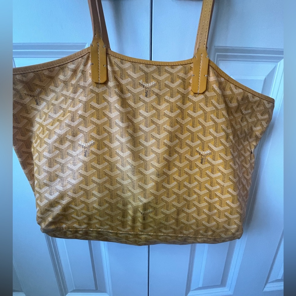 yellow goyard bag